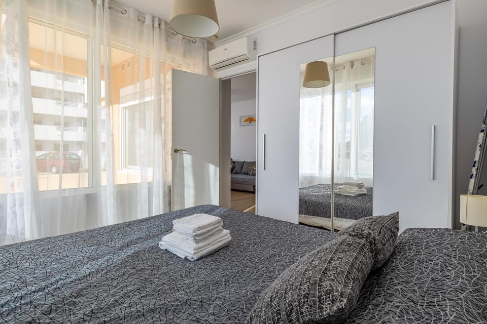 Bed, Photo of the whole room, Bedroom, towels, air conditioner