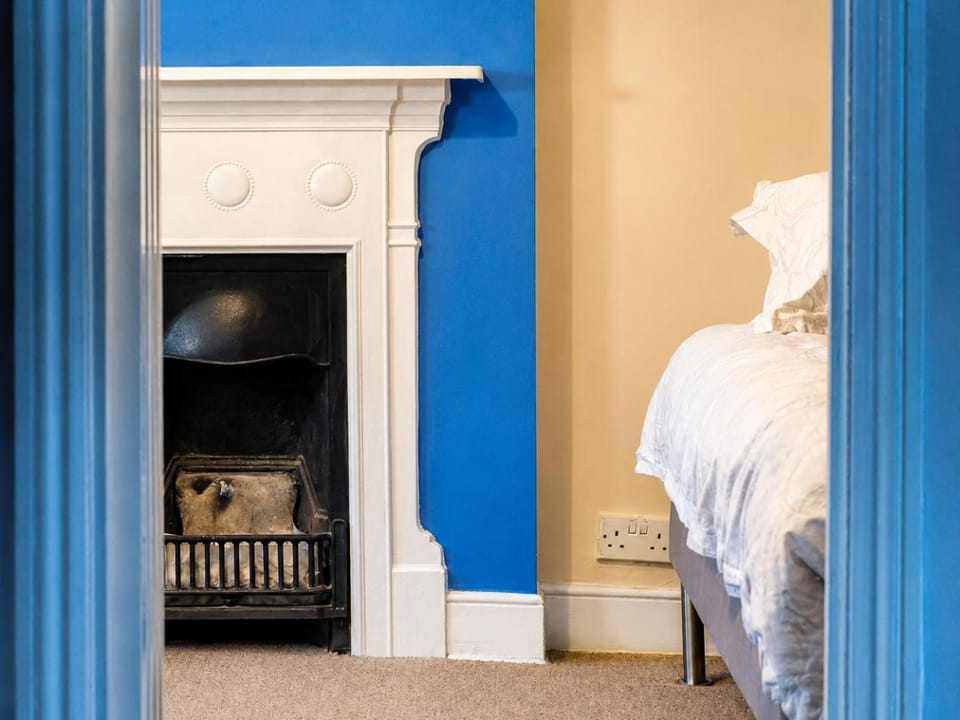 Bed, Decorative detail, Bedroom, fireplace