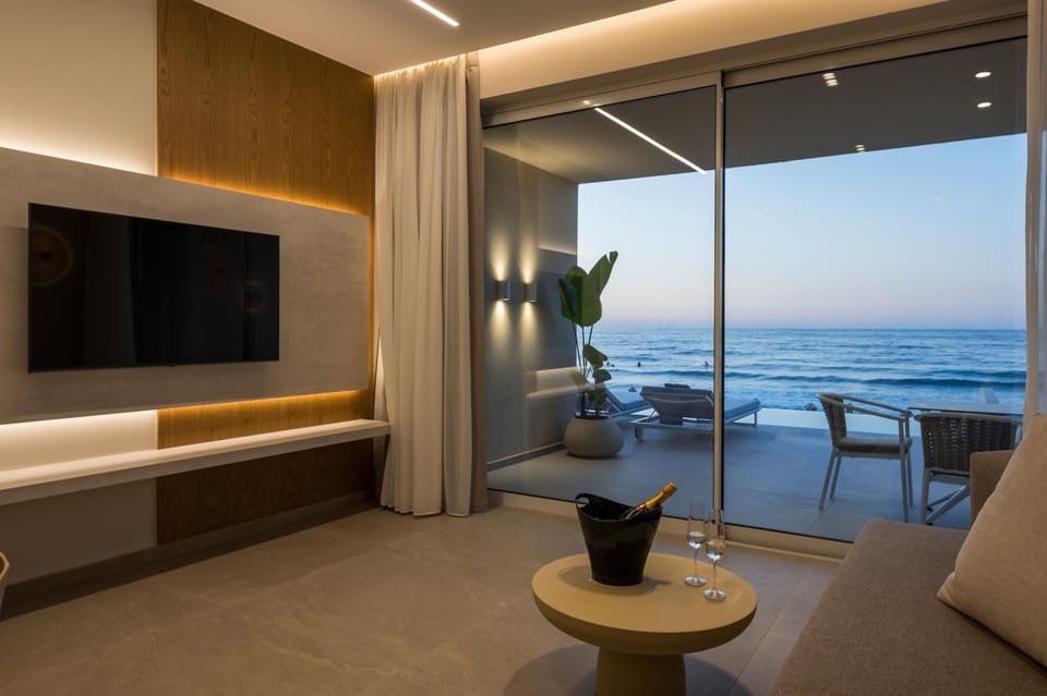 TV and multimedia, View (from property/room), Living room, Seating area, Sea view