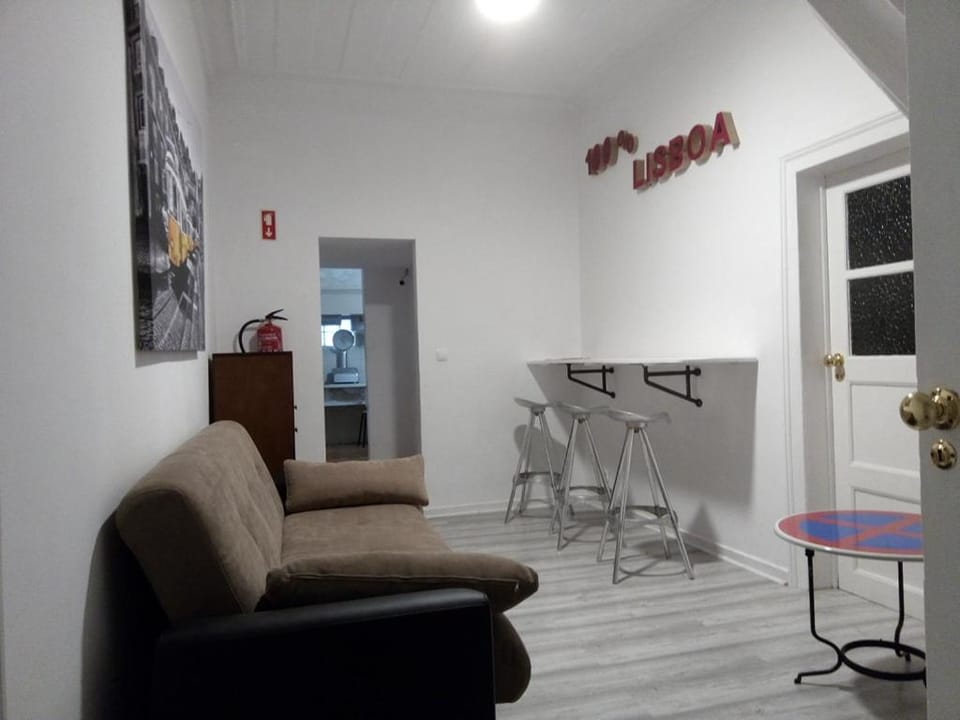 Communal lounge/ TV room, Property logo or sign, TV and multimedia, Living room, Dining area