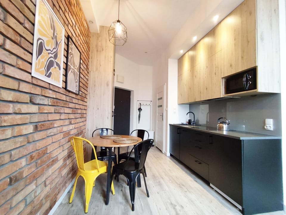 Kitchen or kitchenette, microwave, stove, kitchen