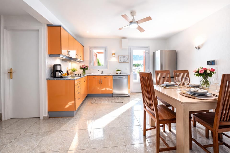 Dining area, dishwasher, stove, kitchen