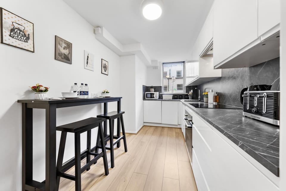 Kitchen or kitchenette, oven, stove, toaster