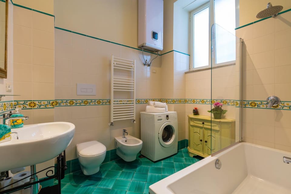 Shower, Toilet, Bathroom, Bath, bidet, towels, washing machine