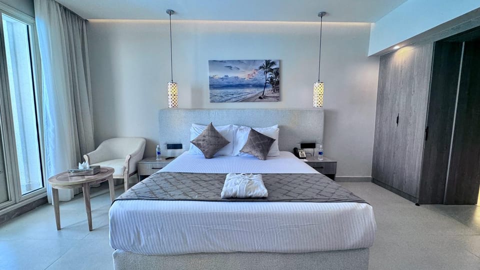Bed, Seating area, Bedroom