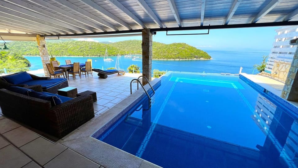 Property building, View (from property/room), Pool view, Sea view, Swimming pool