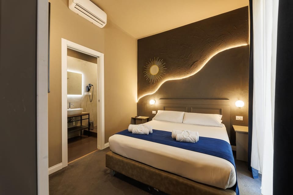 Bed, Photo of the whole room, Bedroom, towels, air conditioner