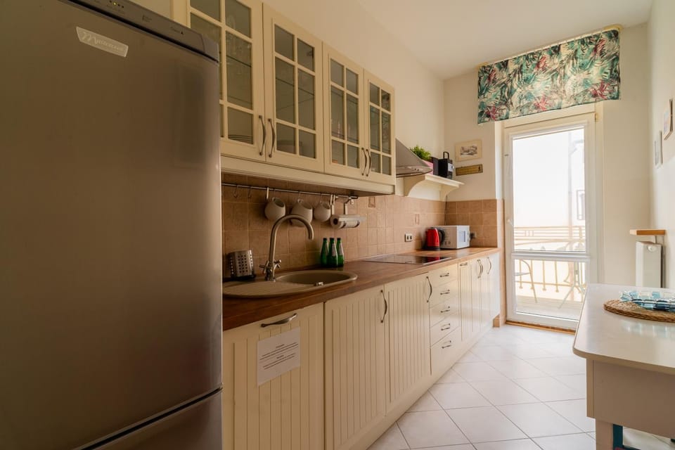 Kitchen or kitchenette, oven, stove