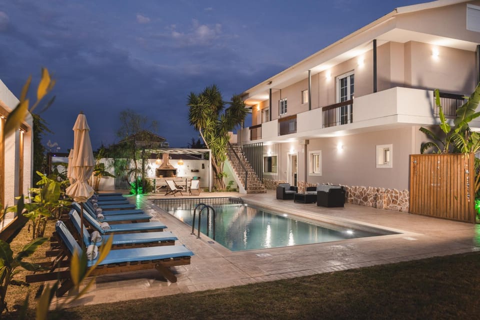 Property building, Night, Natural landscape, Garden, Garden view, Pool view, Swimming pool