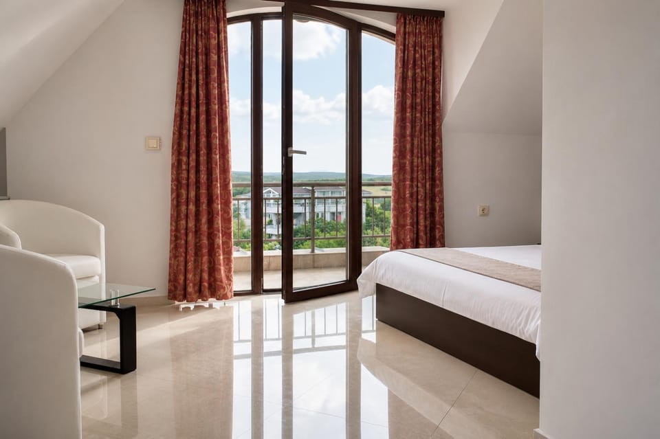 Bed, View (from property/room), Seating area, Bedroom