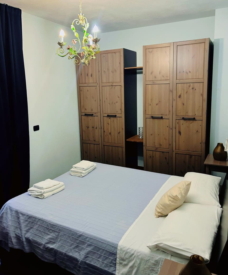 Bed, Photo of the whole room, Bedroom, towels, wardrobe