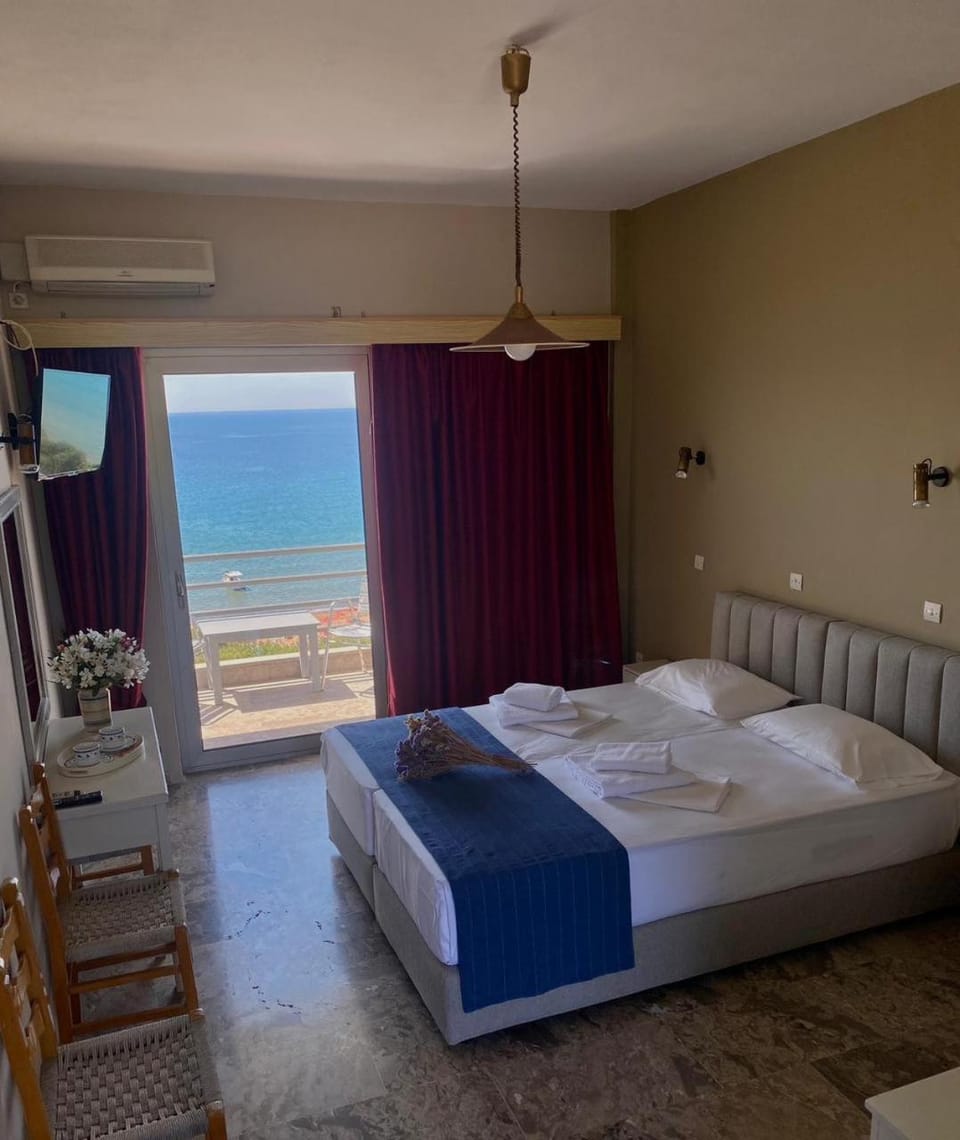 Bed, Natural landscape, TV and multimedia, Beach, Bedroom, Sea view, towels, air conditioner