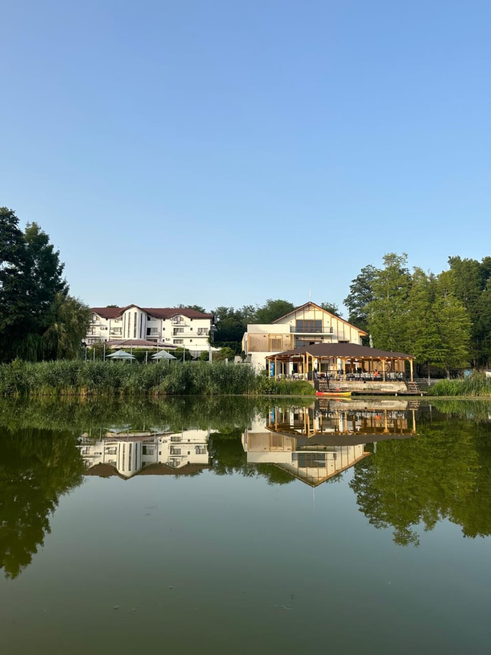 Property building, Day, Natural landscape, Lake view