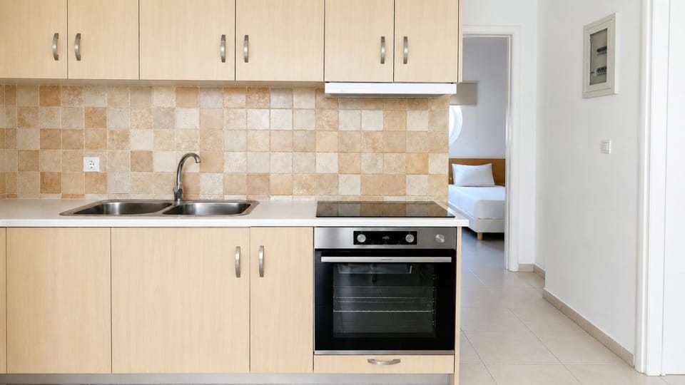 Kitchen or kitchenette, oven, stove