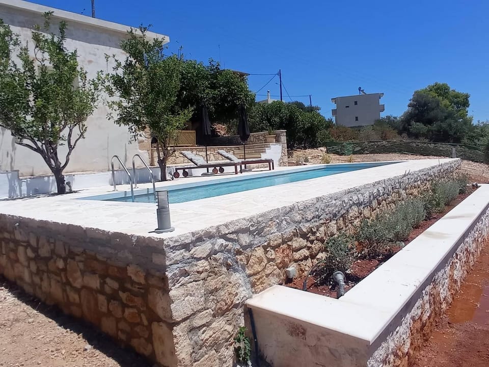 Property building, Day, Natural landscape, Pool view, Swimming pool