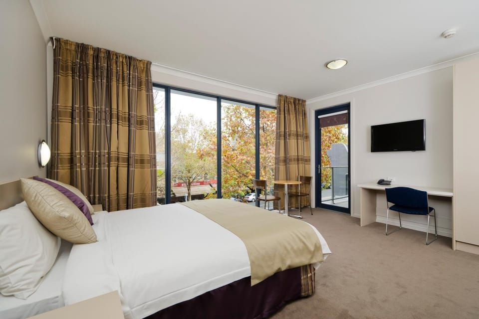 Bed, Living room, Seating area, Bedroom