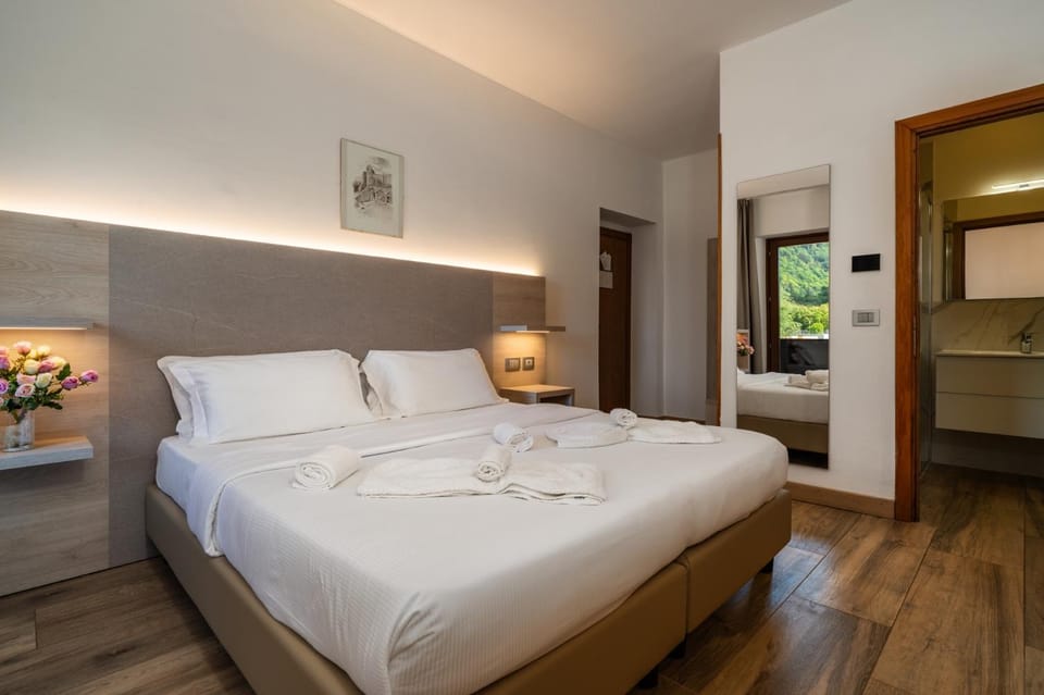 Bed, Photo of the whole room, Bedroom, towels, wardrobe