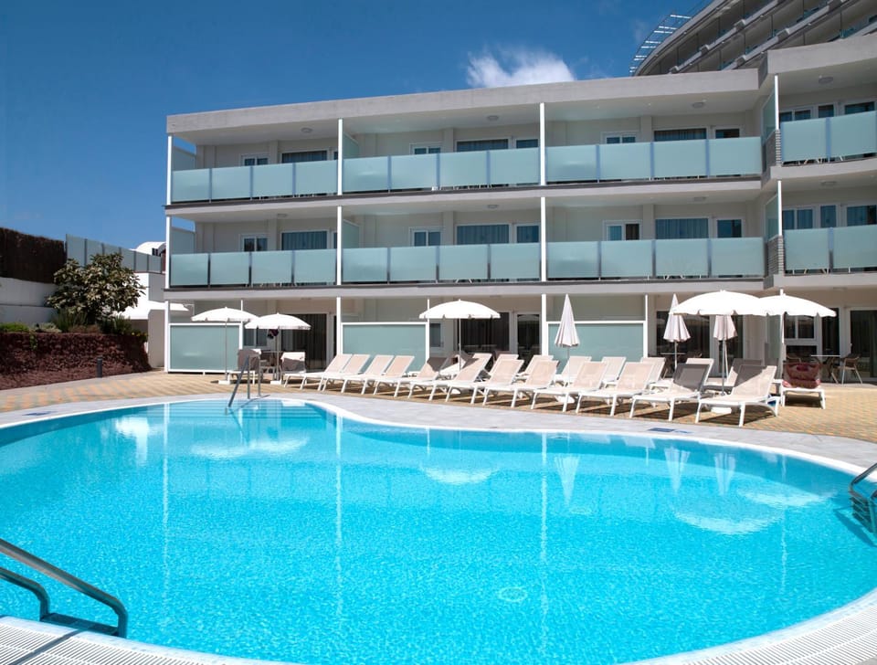 Property building, Pool view, Swimming pool, sunbed