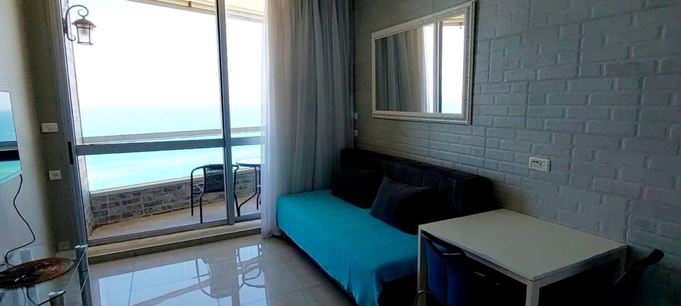 View (from property/room), Balcony/Terrace, Living room, Seating area, Sea view