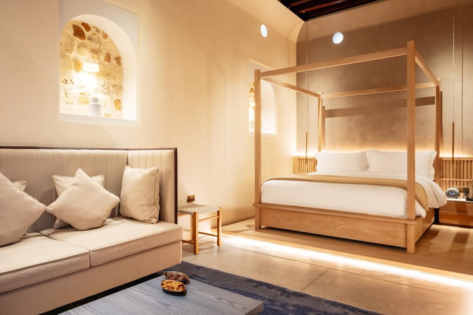 Bed, Living room, Seating area, Bedroom
