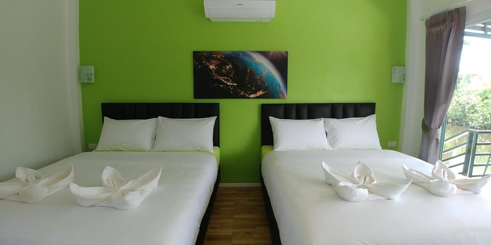 Bed, Photo of the whole room, Bedroom, towels, air conditioner