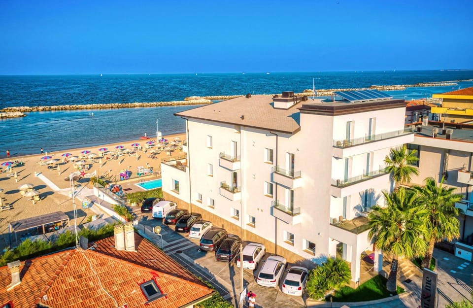 Property building, Beach, Swimming pool, Parking