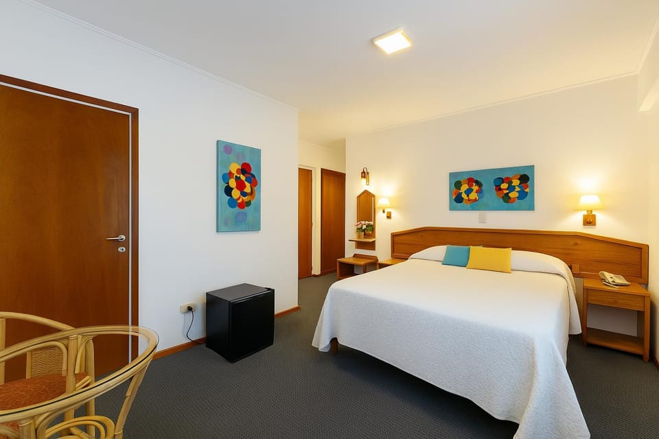 Bed, towels, wardrobe