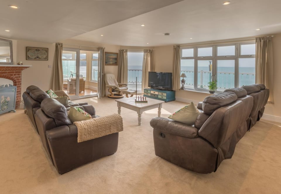 Bird's eye view, Seating area, Beach, Text overlay