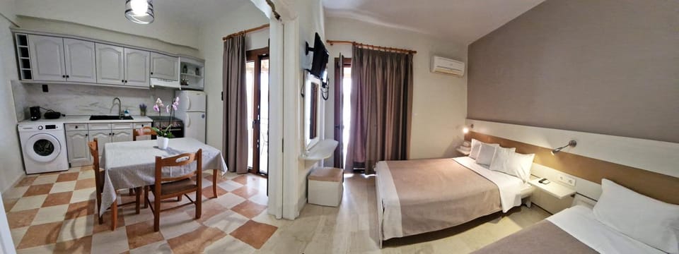 Bed, Kitchen or kitchenette, Photo of the whole room, Seating area, Dining area, Bedroom, oven, towels, washing machine, dryer