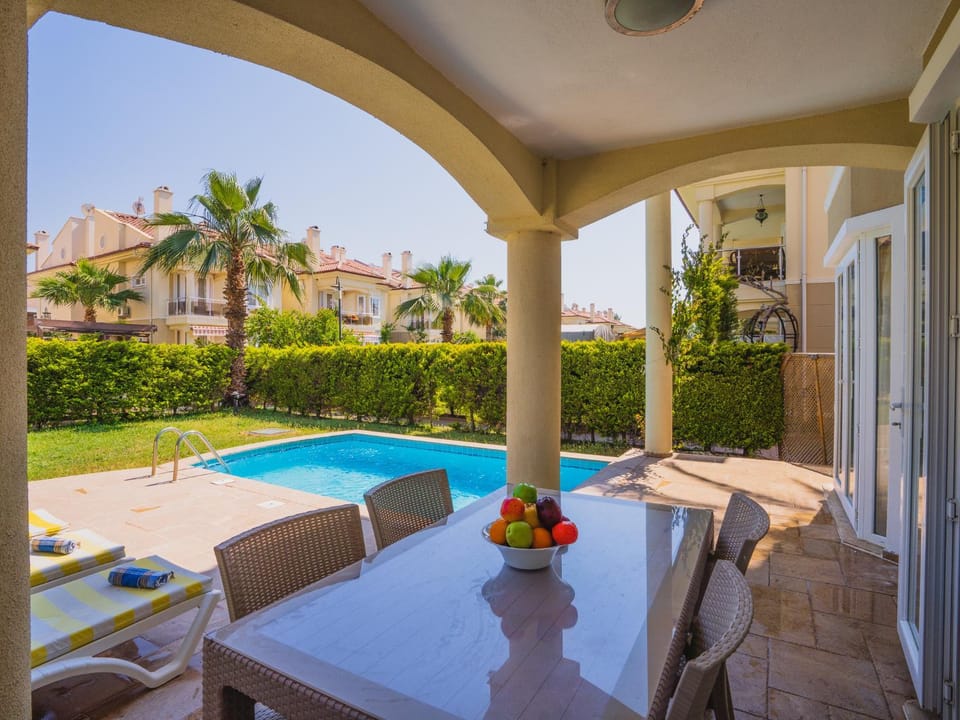 Property building, Balcony/Terrace, Seating area, Dining area, Garden view, Swimming pool, sunbed