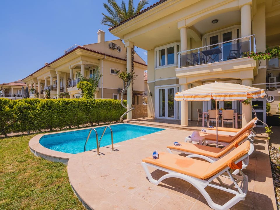 Property building, Patio, Spring, Garden, View (from property/room), Balcony/Terrace, Garden view, Pool view, sunbed