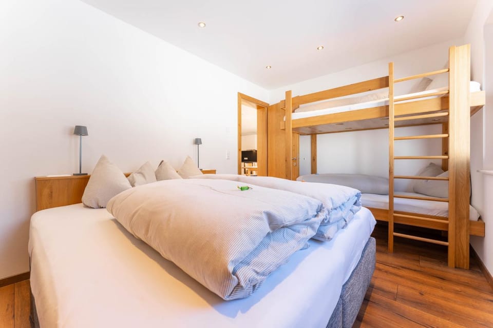 Bed, Photo of the whole room, Bedroom, bunk bed, towels, wardrobe