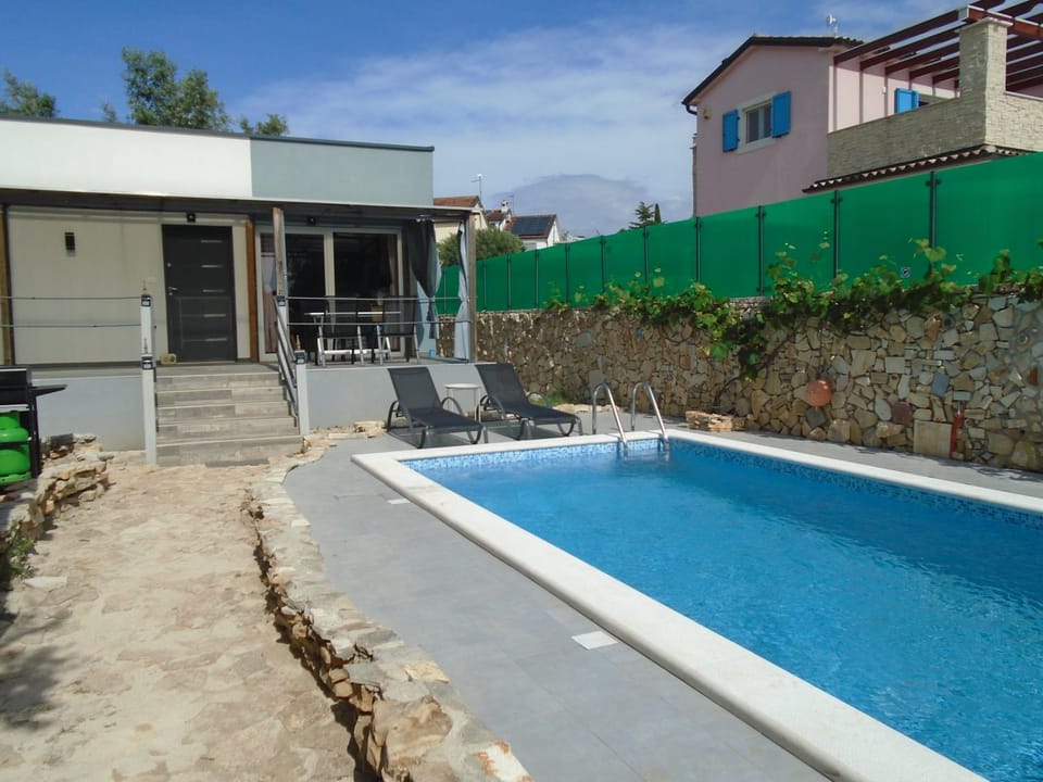 House Nikolas 1 with Pool, close to the Beach House in Fažana