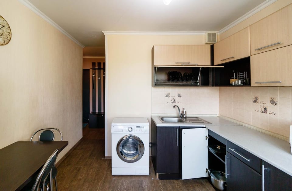 Dining area, minibar, washing machine, kitchen
