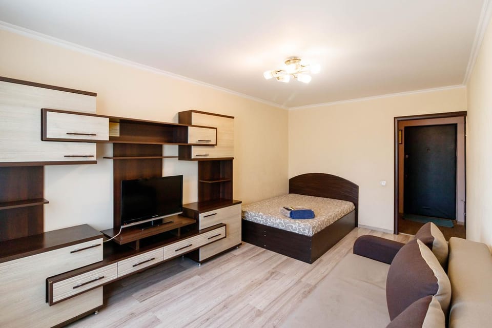 Bed, TV and multimedia, Living room, Seating area, Bedroom, air conditioner