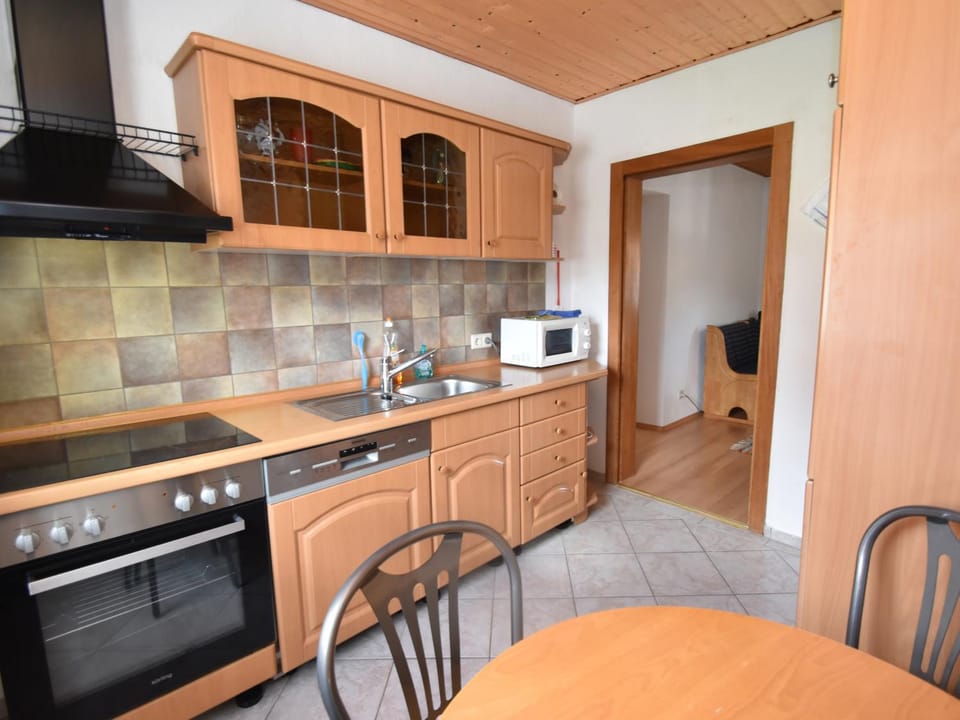 Kitchen or kitchenette, Decorative detail, Food, Quiet street view, dishwasher, microwave, stove, toaster, kitchen