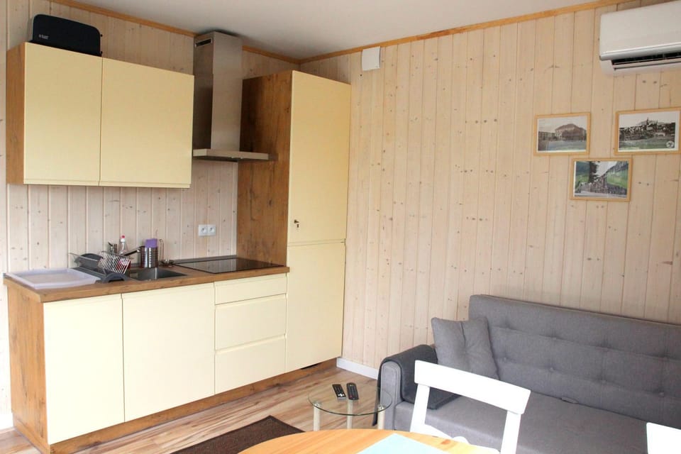 Kitchen or kitchenette, Living room, Seating area, Dining area