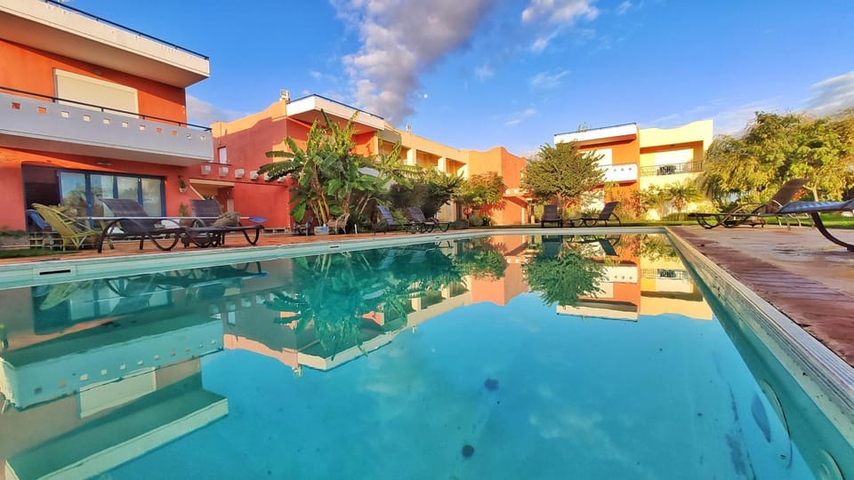 Property building, Swimming pool, Sunrise, Sunset