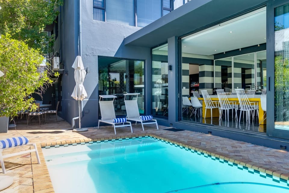 Property building, Patio, Swimming pool, sunbed