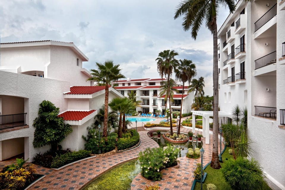 Property building, Facade/entrance, Day, Garden, Swimming pool