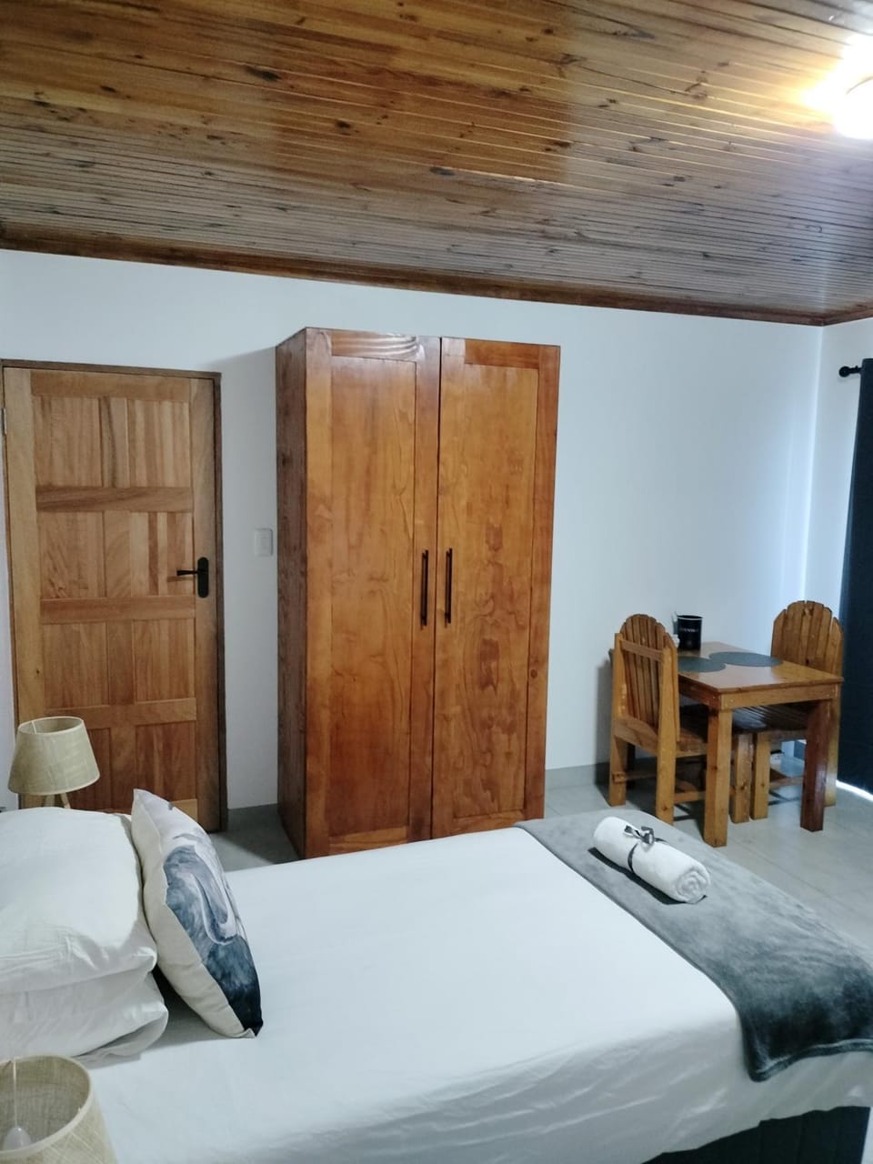 Seating area, Bedroom, towels, wardrobe