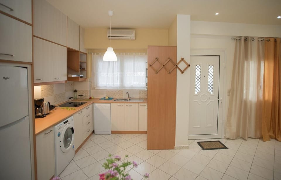 Kitchen or kitchenette, dishwasher, oven, stove, washing machine, air conditioner