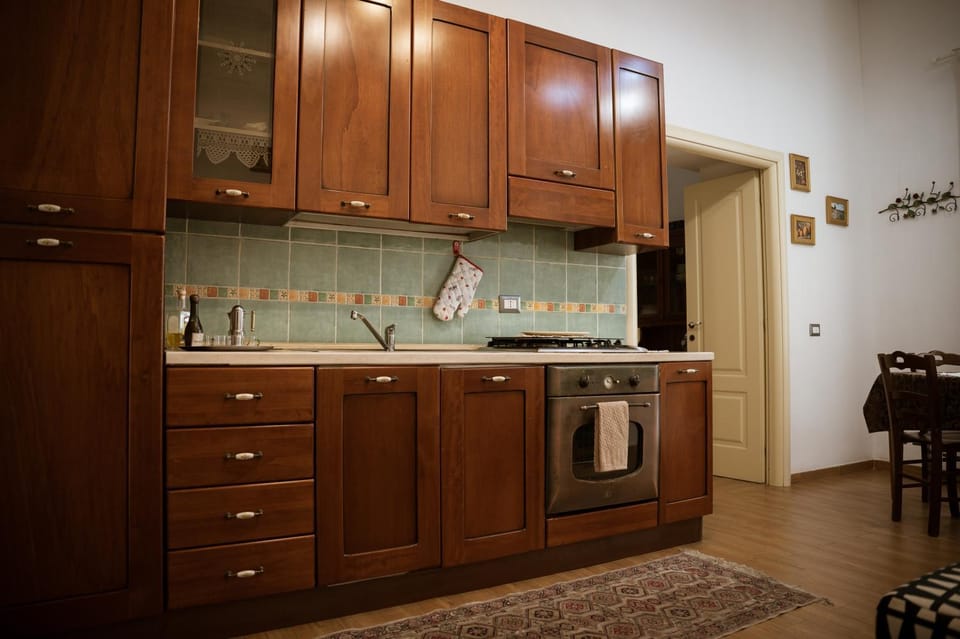 Kitchen or kitchenette, oven, stove