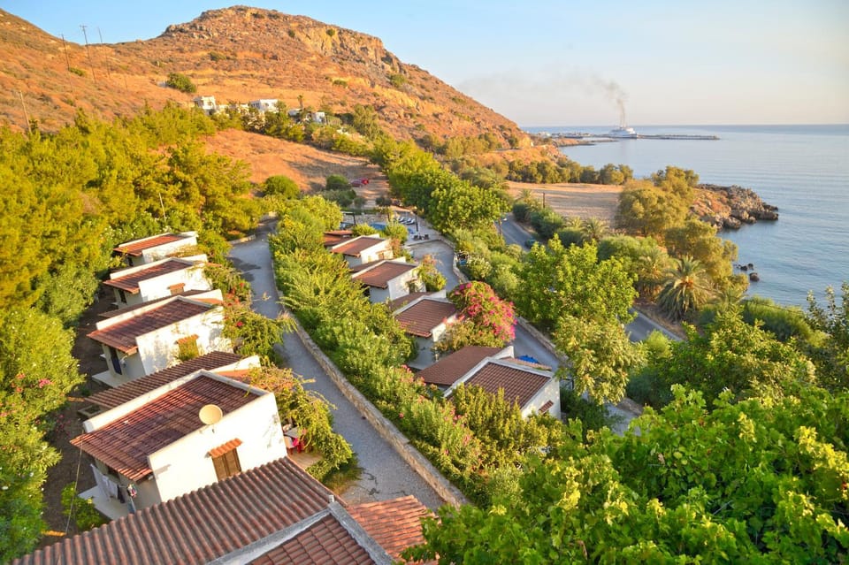 Property building, Nearby landmark, Facade/entrance, Natural landscape, Bird's eye view, Summer, View (from property/room), Mountain view, Sea view, Area and facilities, Sunset