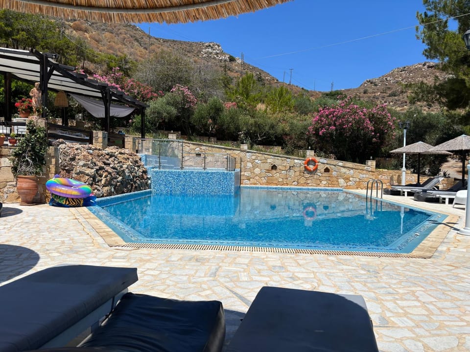 Patio, Day, Natural landscape, Mountain view, Pool view, Swimming pool, sunbed