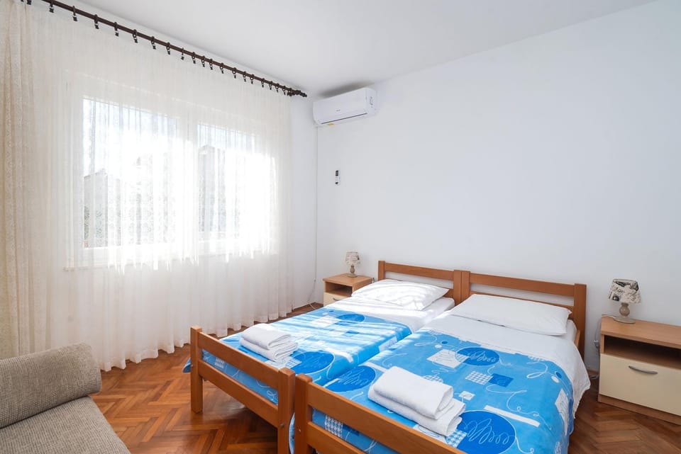 Bed, Photo of the whole room, Bedroom, towels, air conditioner