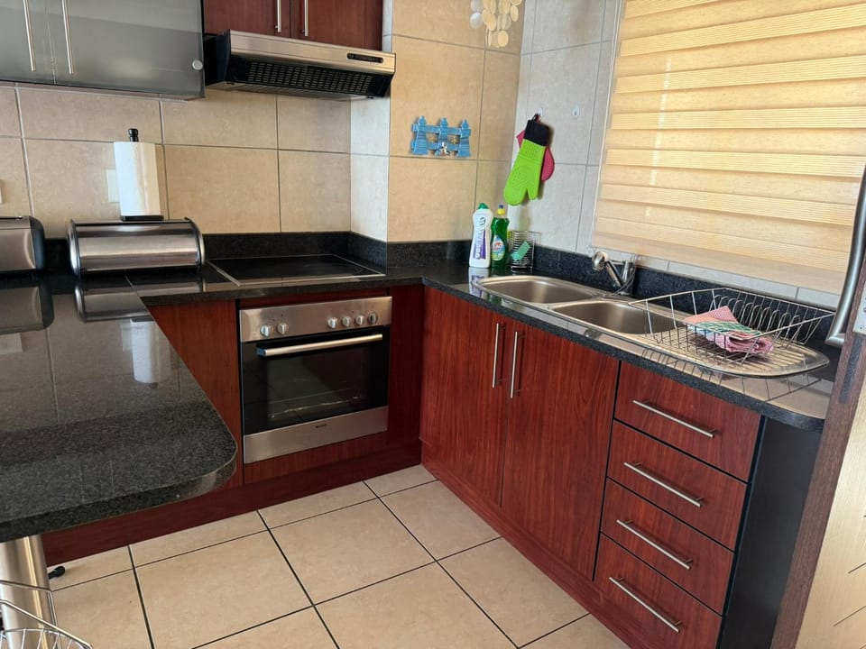 Kitchen or kitchenette, stove, toaster