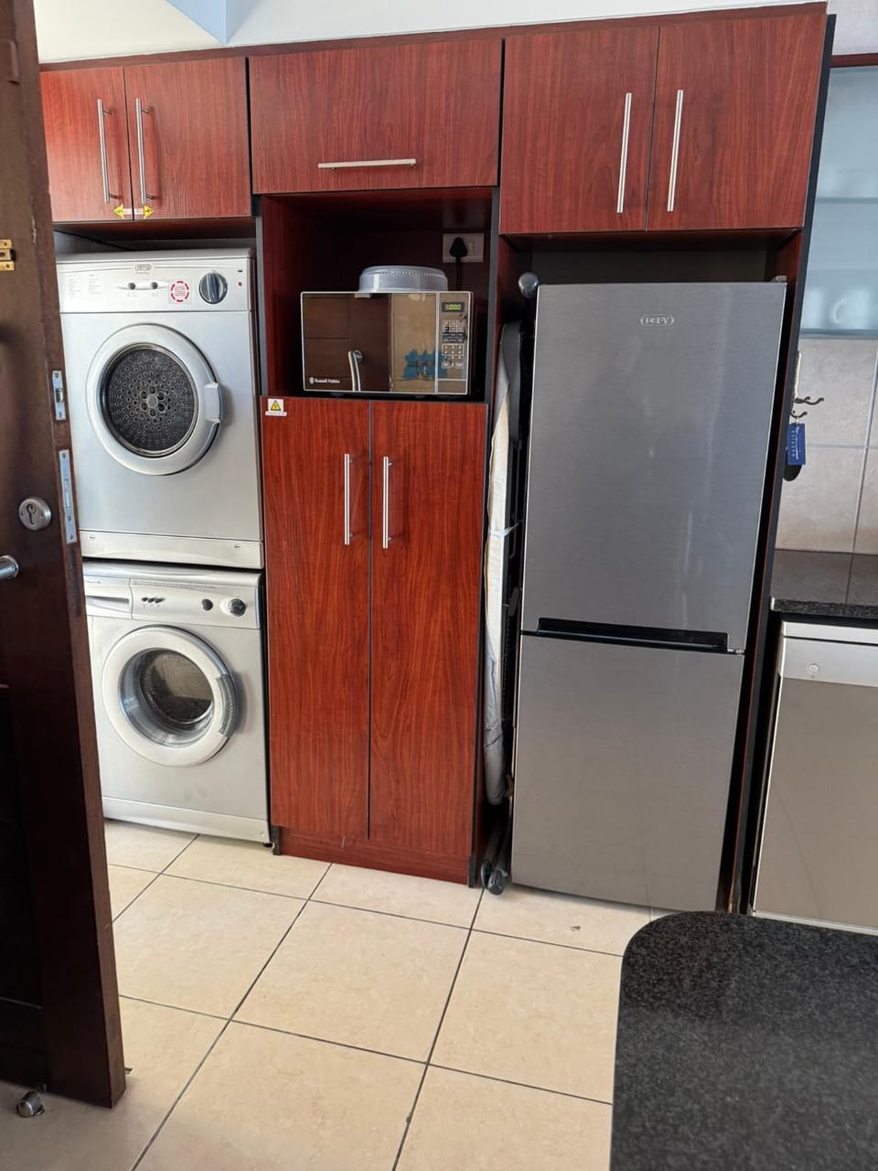Kitchen or kitchenette, dishwasher, washing machine, dryer