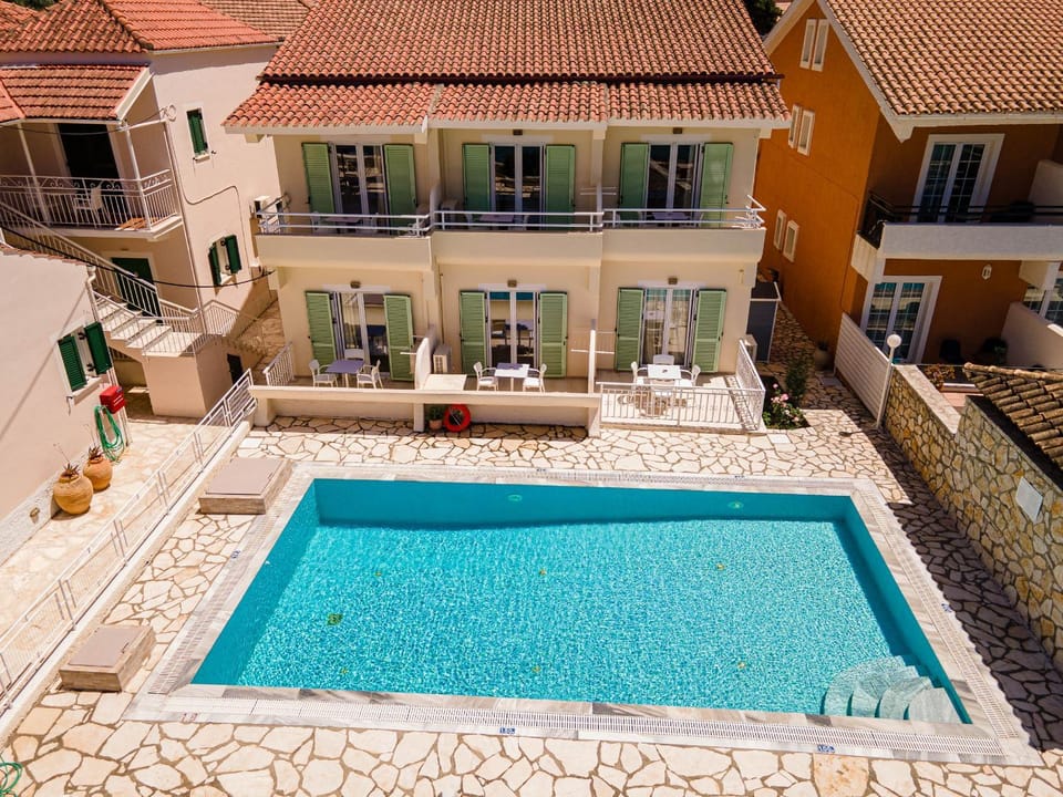 Property building, Patio, View (from property/room), Balcony/Terrace, Pool view, Swimming pool, sunbed