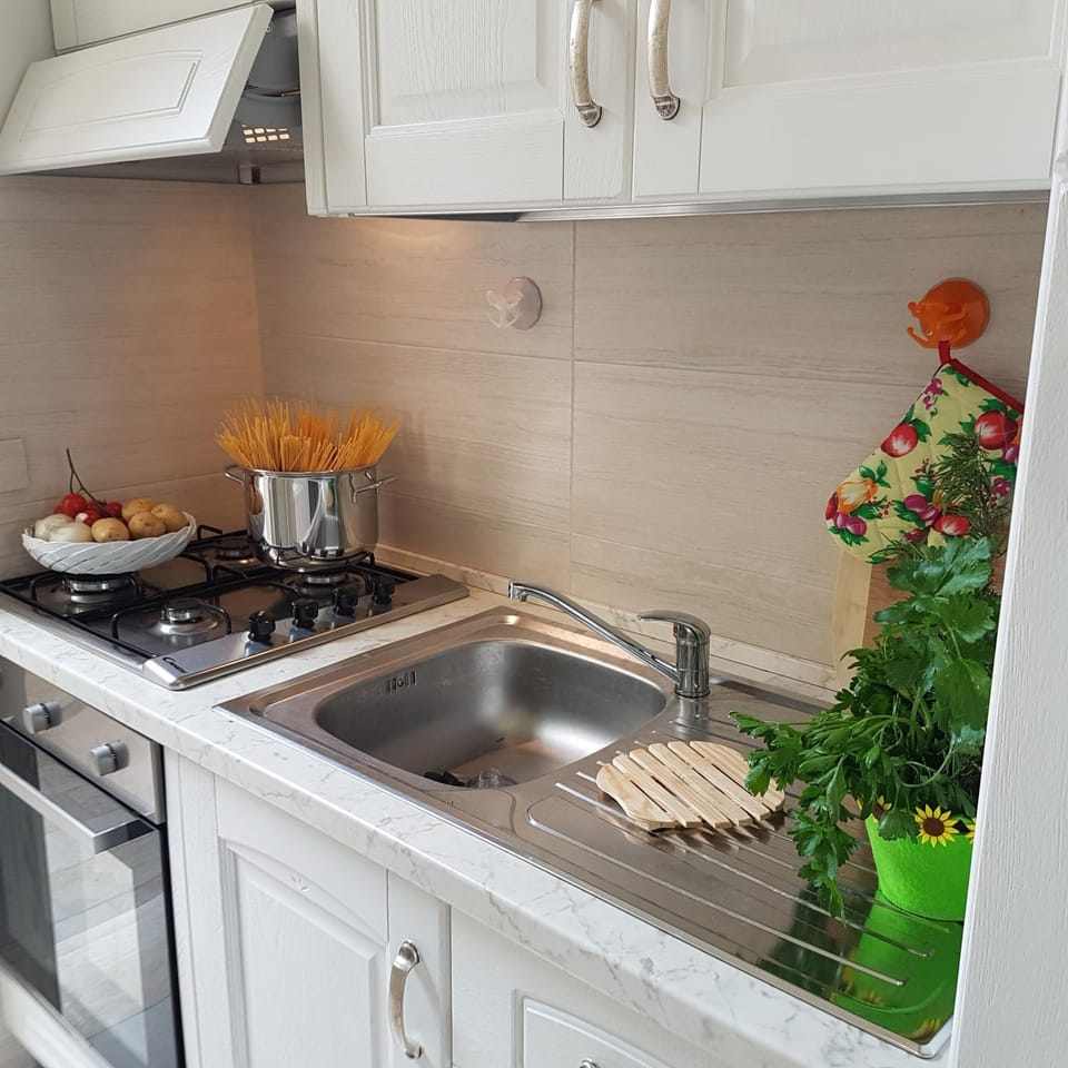 Kitchen or kitchenette, stove